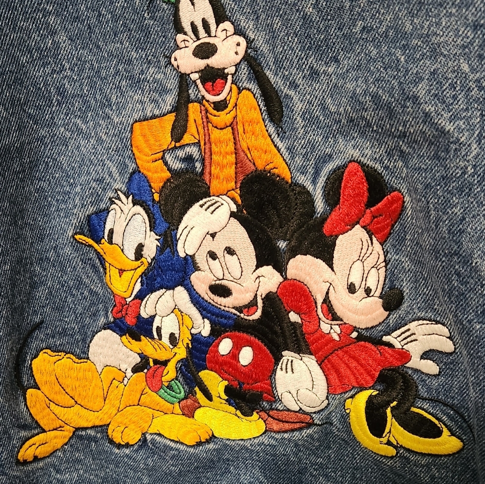 Disney Store Denim jacket. Size Adult XL.  Disney vintage Mickey and friends